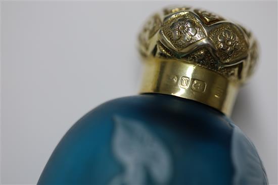 A late Victorian silver gilt mounted cameo glass scent bottle, in the manner of Thomas Webb, 84mm.